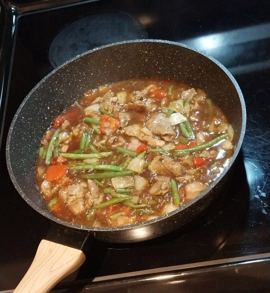 PF CHANG'S Mongolian Beef Frozen Food Cooking in a Pan