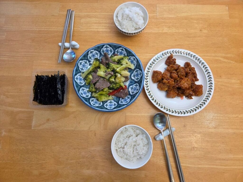 Beef with Broccoli and General Tao Chicken served with steamed white rice and roasted seaweed