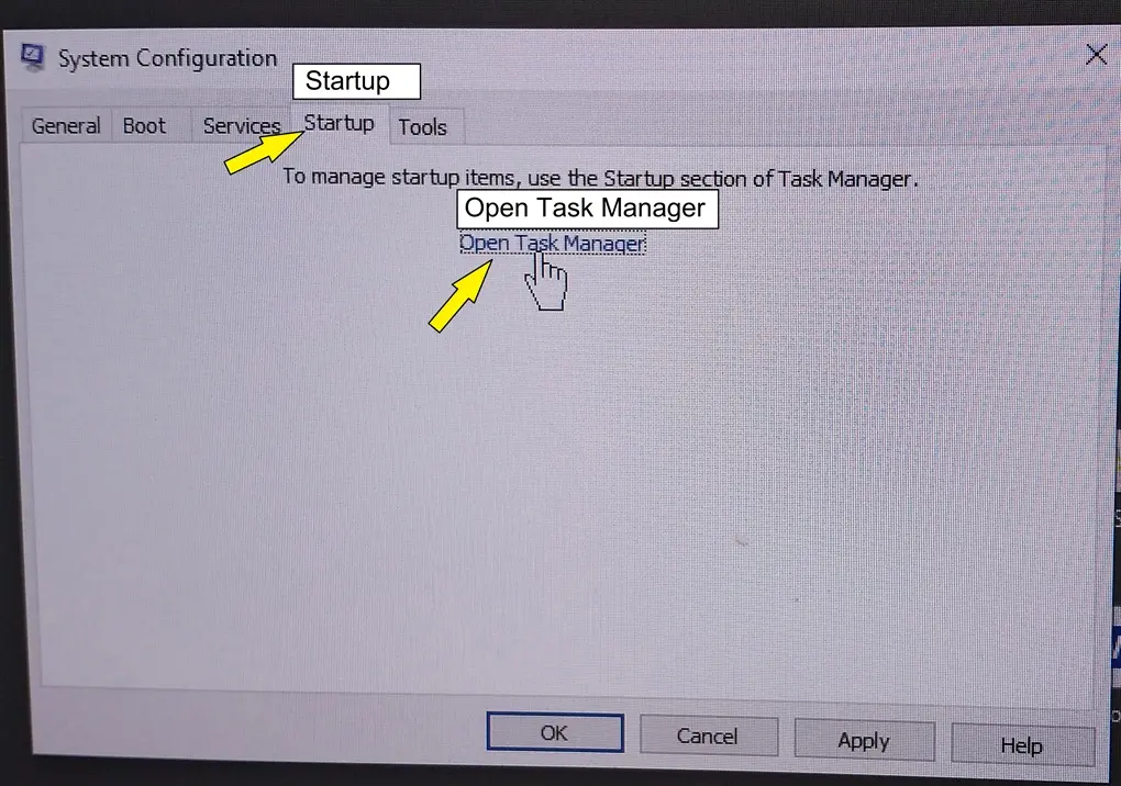 Clicking the Open Task Manager link under the Startup tab in the System Configuration utility
