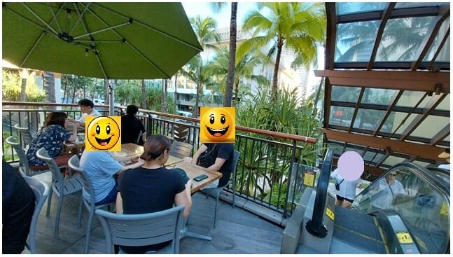Open-air second floor seating at Island Vintage Coffee