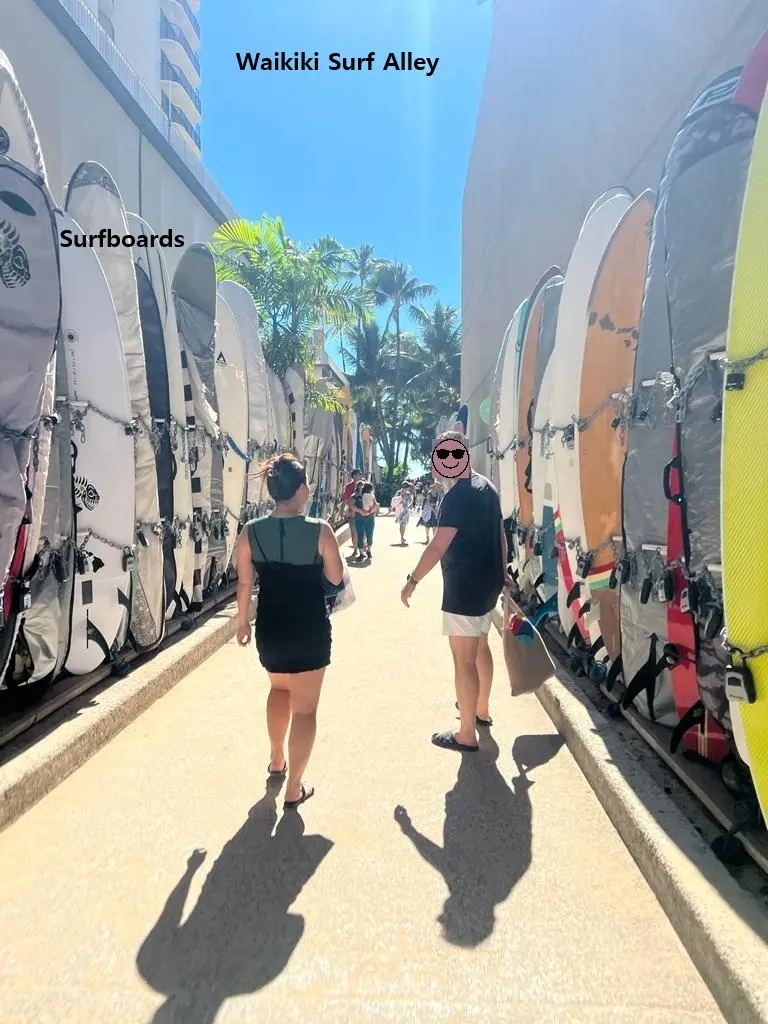 The vibrant entrance of Waikiki Surf Alley decorated with colorful surfboards, a scenic stop on an Oahu Hawaii first day itinerary